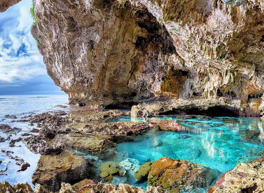Local sea cave and crystal-clear rock pool